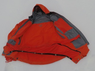 Snowskirt being partially unzipped from the right